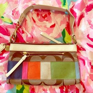 Signature stripe clutch